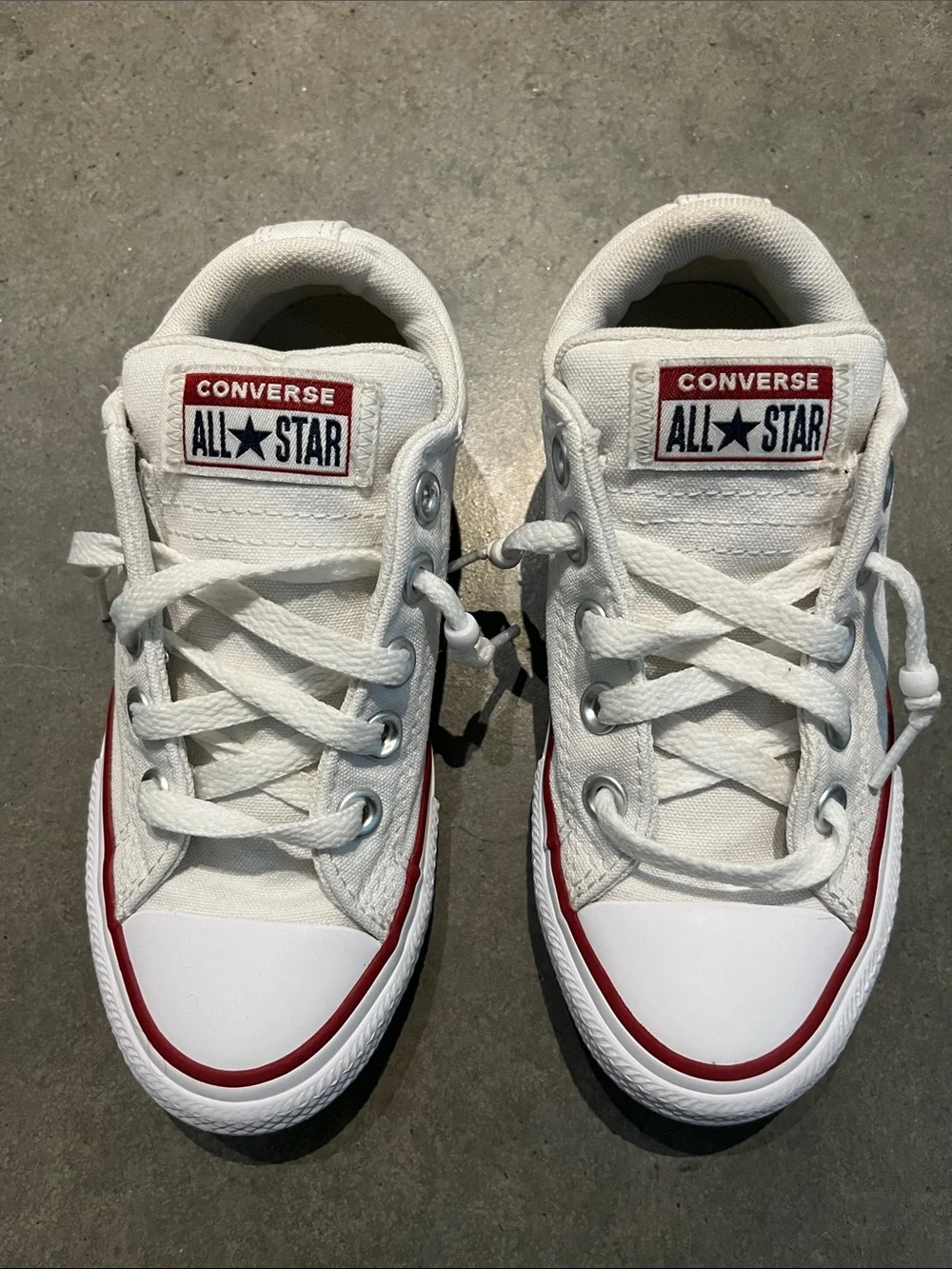 Converse Kids Low Top Sneakers in White with Red Trim